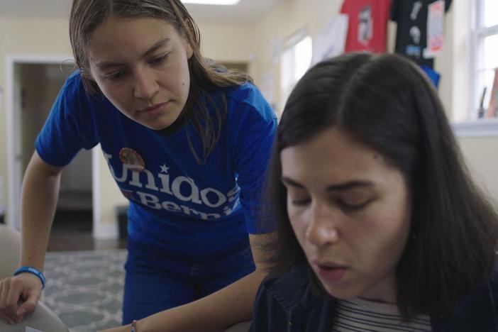 A multicultural coalition of Sanders' supporters prepare to canvass.