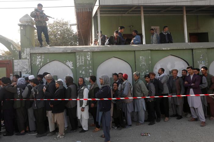 Millions vote in Afghanistan's long-delayed election