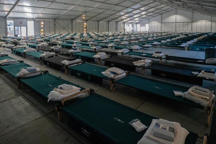 News Wrap: New York City opens temporary housing site for migrants