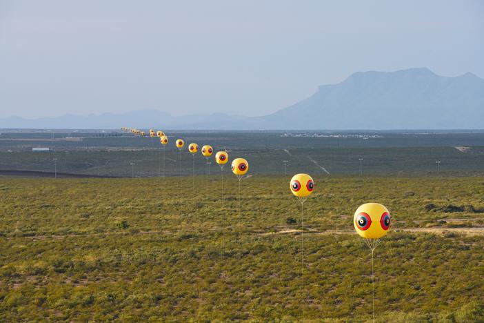 An art installation representing a metaphorical "stitching" of the U.S.-Mexico border.