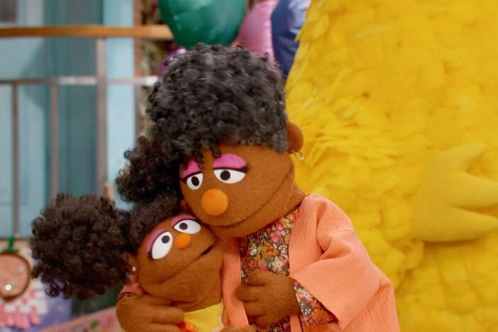 Elmo, Tamir, and Gabrielle help Grandma Nell on Grandparents’ Day.