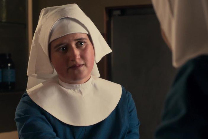 Sister Julienne helps Sister Frances treat a skin disease.