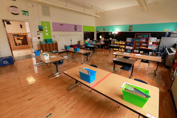 Balancing in-person and virtual learning during the pandemic takes toll on teachers