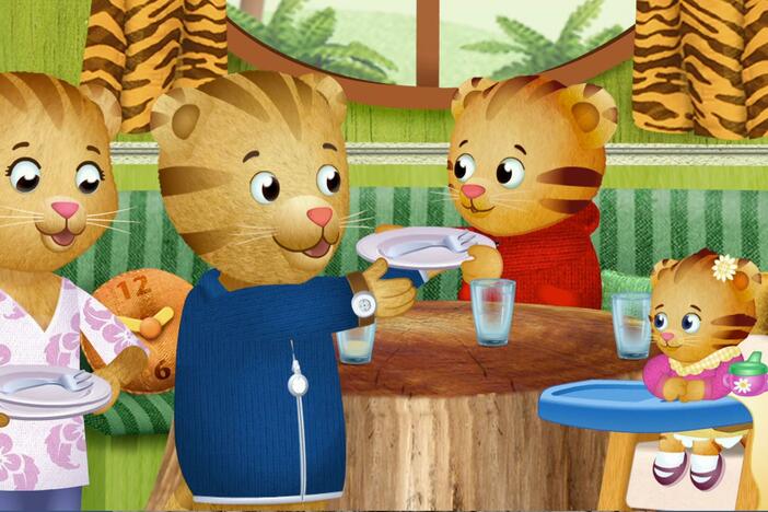 The Tiger family has special ways of cleaning, playing, and singing together.