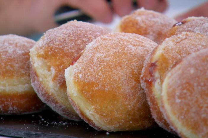 The bakers are challenged to make 10 consistent jam doughnuts.