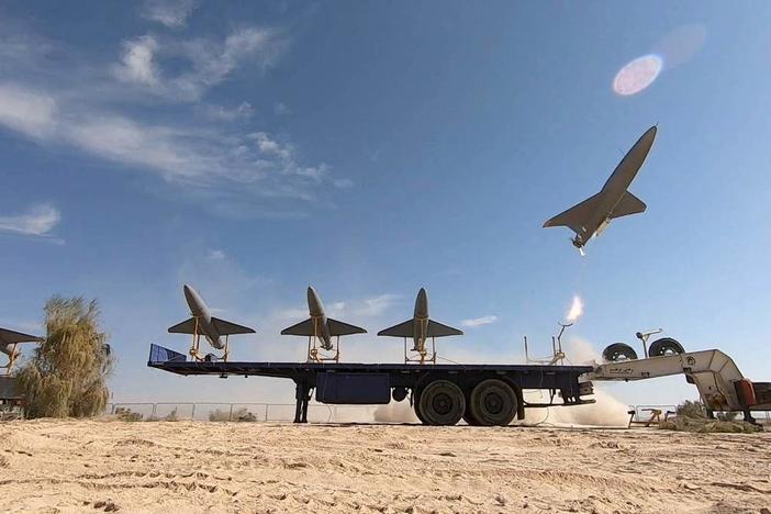 U.S. hits Iran with new sanctions while urging Israel against military response