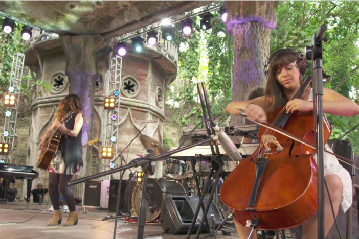 A cellist studies classical music at a Cuban conservatory and plays in a pop/rock band.