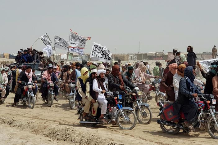 Afghans fear Taliban retribution as group expands control, executes critics
