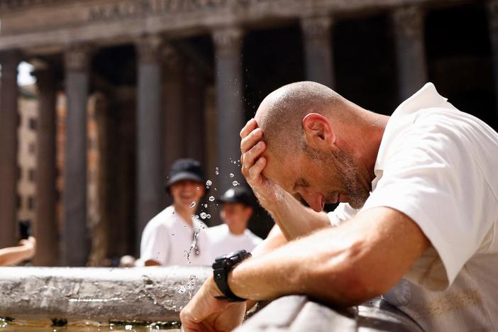 Punishing heat waves break records and disrupt life across much of the world
