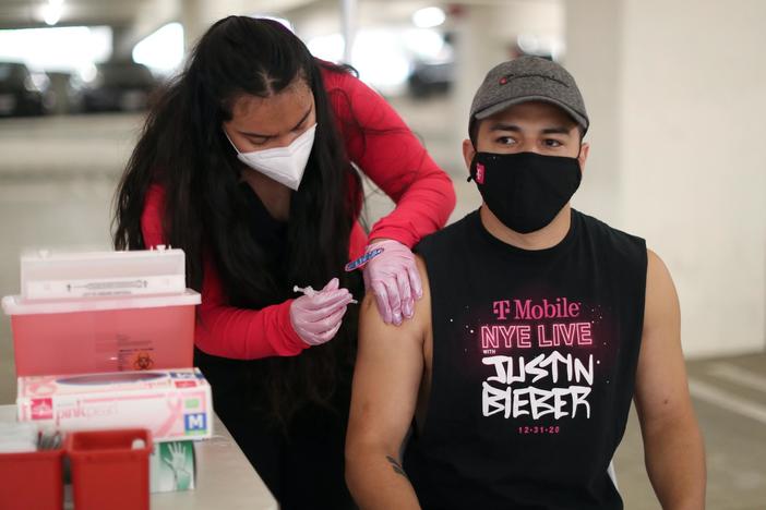 News Wrap: Half of all U.S. adults have received at least one vaccine dose, CDC says