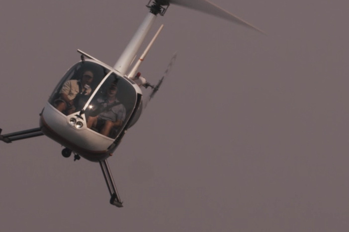 Wildlife cameraman Bob Poole shows how to cheat an aerial view of the eland capture.
