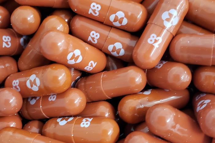 Merck's antiviral pill may help beat COVID-19, but vaccines and testing still needed