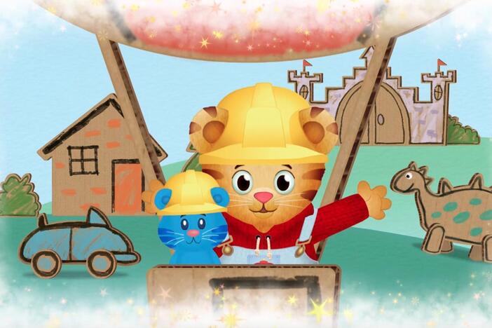 Daniel makes believe he lives in a cardboard world where he can make anything!