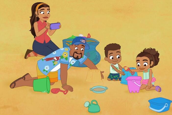 Junior misses his sandcastle, but Alma reminds him they have photos to remember it.
