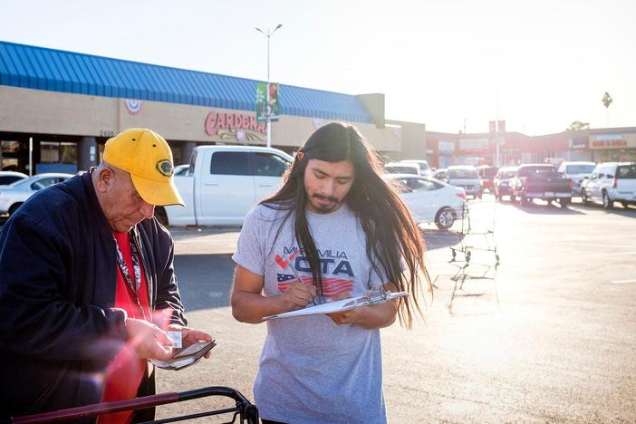 Mi Familia Vota organizers register Latino voters in Las Vegas ahead of the 2020 election.