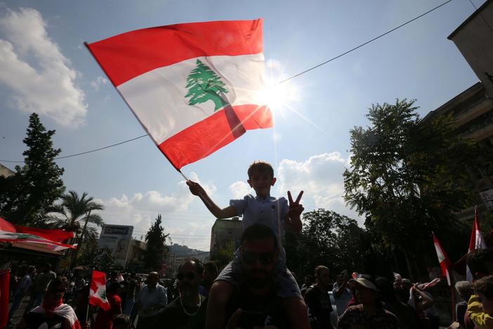 News Wrap: Lebanese government approves economic reforms amid mass protests