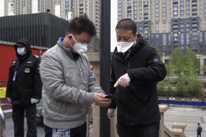 To reopen the city, Wuhan, China is using digital gatekeeping to contact trace. Here’s how