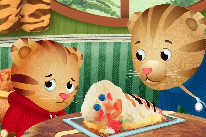 Daniel is disappointed that his cake is smushed. But it still tastes yummy. 