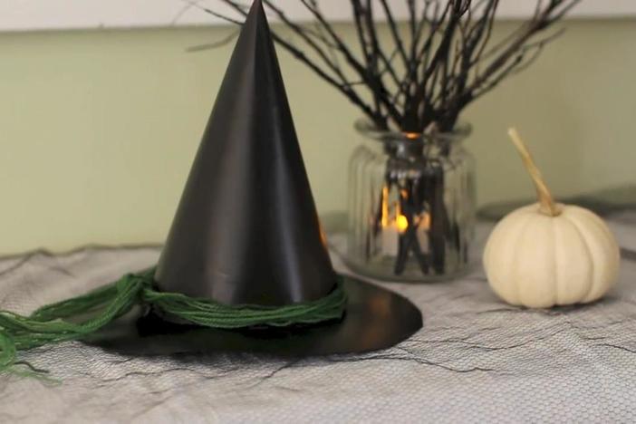 Turn an ordinary birthday party hat and a cereal box into a witch hat in just a few steps.