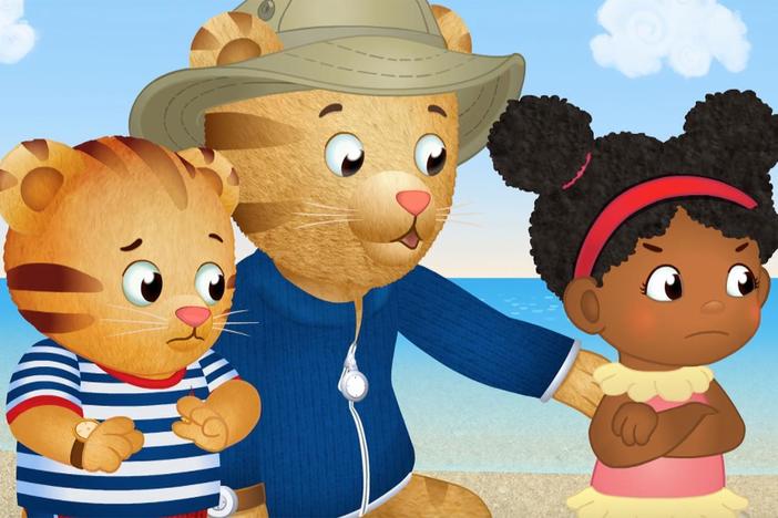 Daniel and Miss Elaina are playing at the beach. But there's too much splashing.