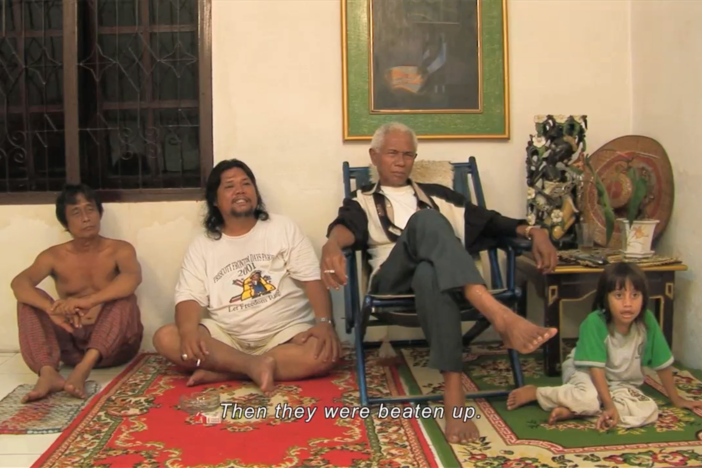 Anwar watches the clip "How to Kill with Less Blood" and reflects.