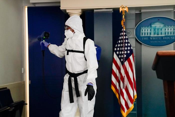 During 1st day back at White House, Trump suspends pandemic aid talks