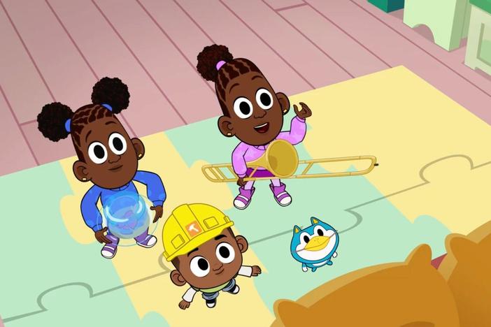 The Loops siblings act out their version of the "Three Little Pigs".