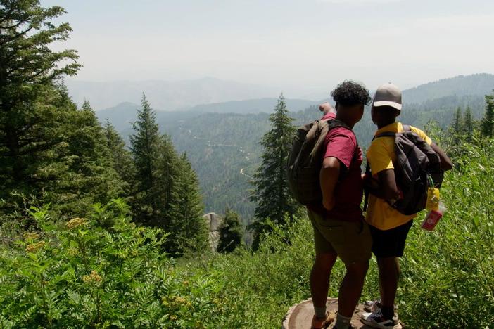 Baratunde talks with newly settled refugees about their connection to the Idaho wilderness