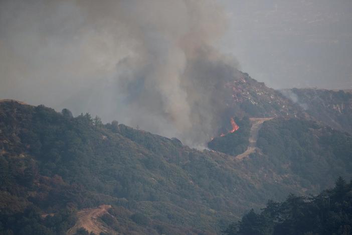 News Wrap: Wildfires still burning across California, Pacific Northwest