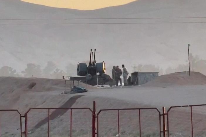 Why Israeli and Iranian officials downplayed apparent retaliatory strike in central Iran