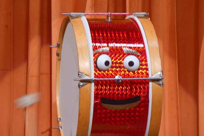 Cookie Monster plays a musical instrument guessing game hosted by Elmo!