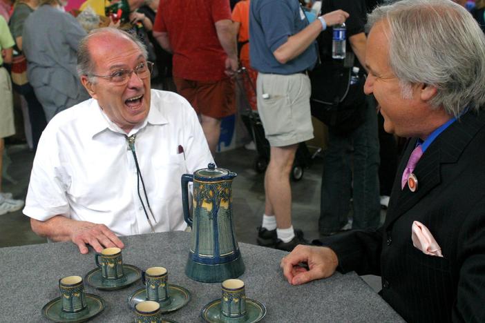 David Rago appraises a sweet set of Newcomb College pottery.
