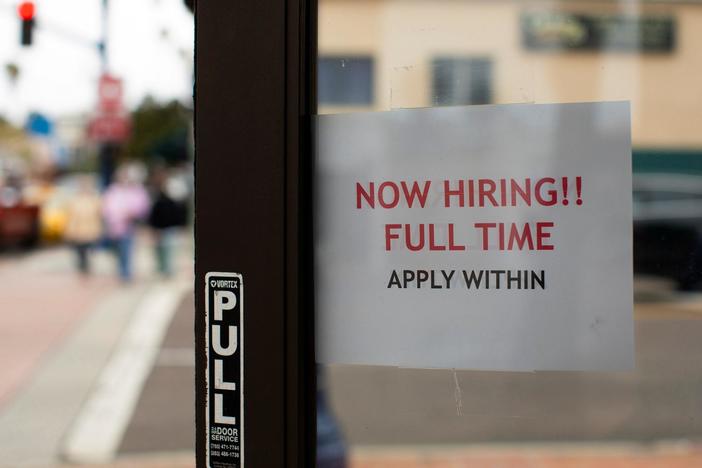 U.S. economy adds more jobs in face of inflation and interest rate hikes