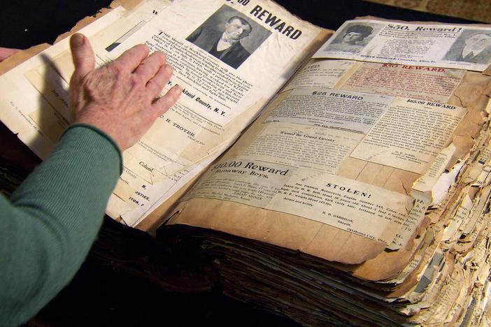 Country star Clint Black is floored by what he learns about his book of wanted posters.