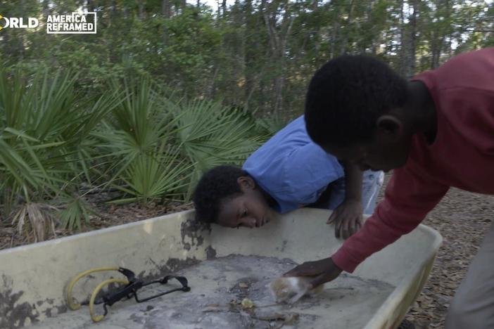 Two young Black brothers grow up together on the Georgia island of Sapelo