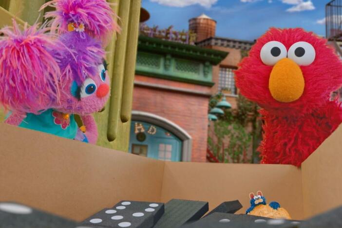 Gabrielle, Elmo, Abby, and Cookie Monster are building a maze for Gabrielle’s class pet.