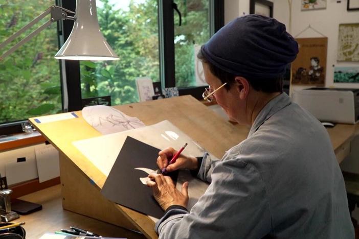 Artist reflects on the natural beauty of the Pacific Northwest with a knife and paper