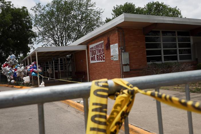 New video shows inaction by Uvalde officers during school shooting