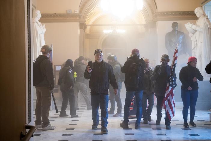 Mayhem erupts in the U.S. Capitol as Congress certifies electoral votes