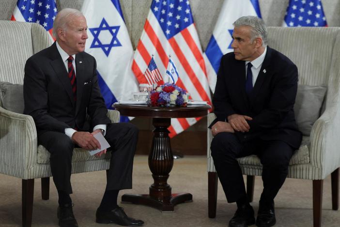 Biden holds talks on Iran with Israel amid calls to address journalist's death