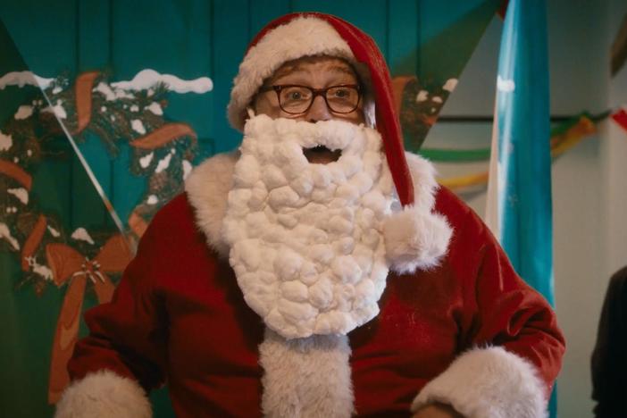 Look out, Poplar… Santa (aka Fred Buckle) has arrived with gifts!