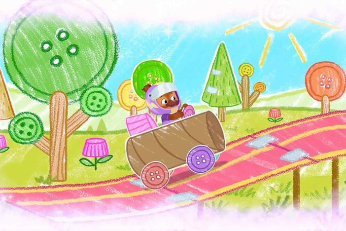 Jodi imagines she is driving a racecar made from things she finds!