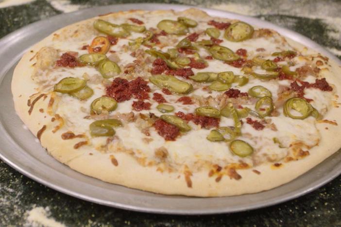 Pati makes a Mexican pizza in Tijuana with chef Javier Plascencia.
