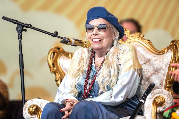 Joni Mitchell surprises fans at Newport Folk Festival