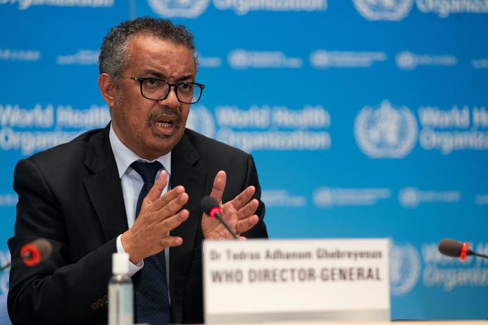 News Wrap: WHO urges continued use of face masks worldwide