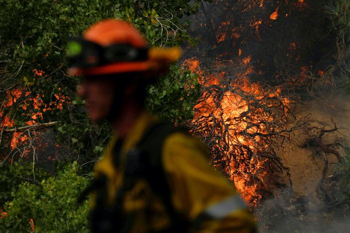 News Wrap: 3 wildfires rage out of control in Southern California