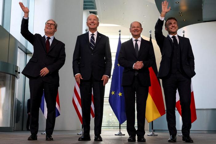 News Wrap: In Berlin, Biden urges Western allies to continue flow of aid to Ukraine