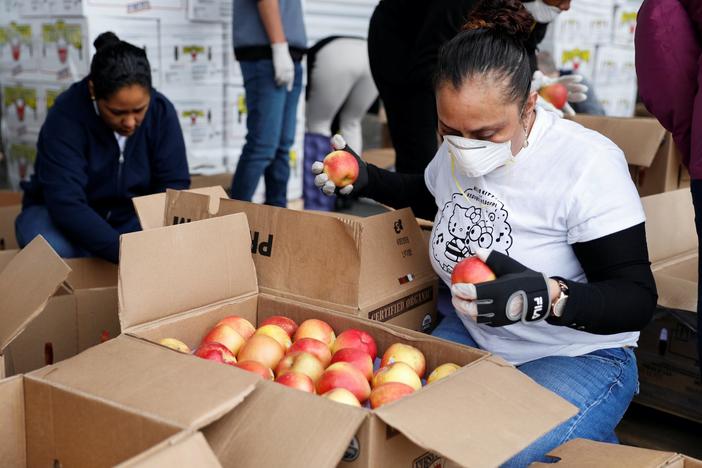 Amid economic crisis, food banks are struggling to keep all the newly hungry fed