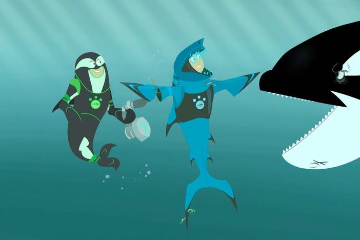 Martin's creature power suit turns him into a shark in front of a giant shark-eating orca!