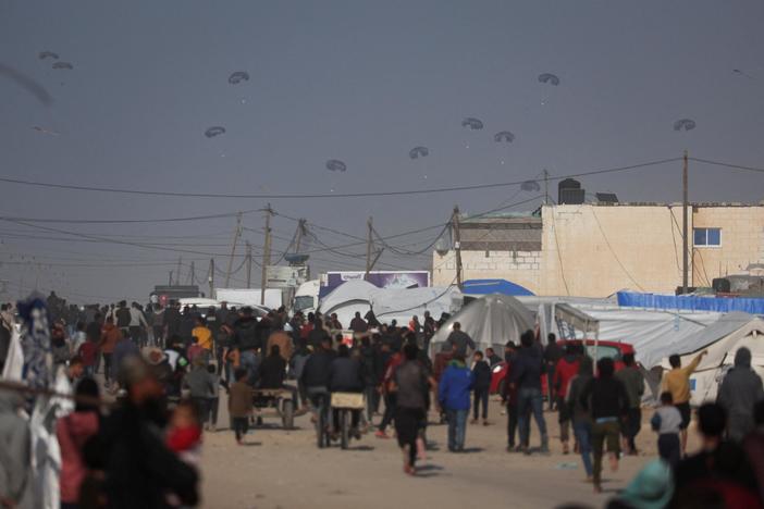 More than 100 killed in Gaza while trying to get food from aid convoy